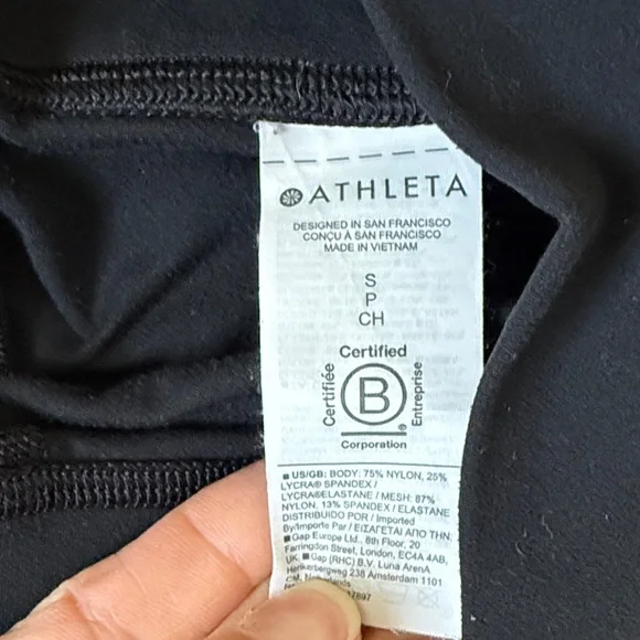 Athleta Black salutation stash pocket mesh panel. 7/8 Leggings - Picture 3 of 6